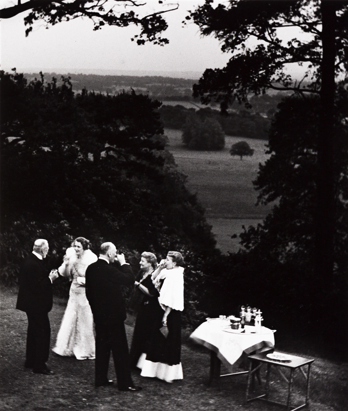 BILL BRANDT (1904-1983) Cocktails in a Surrey Garden.